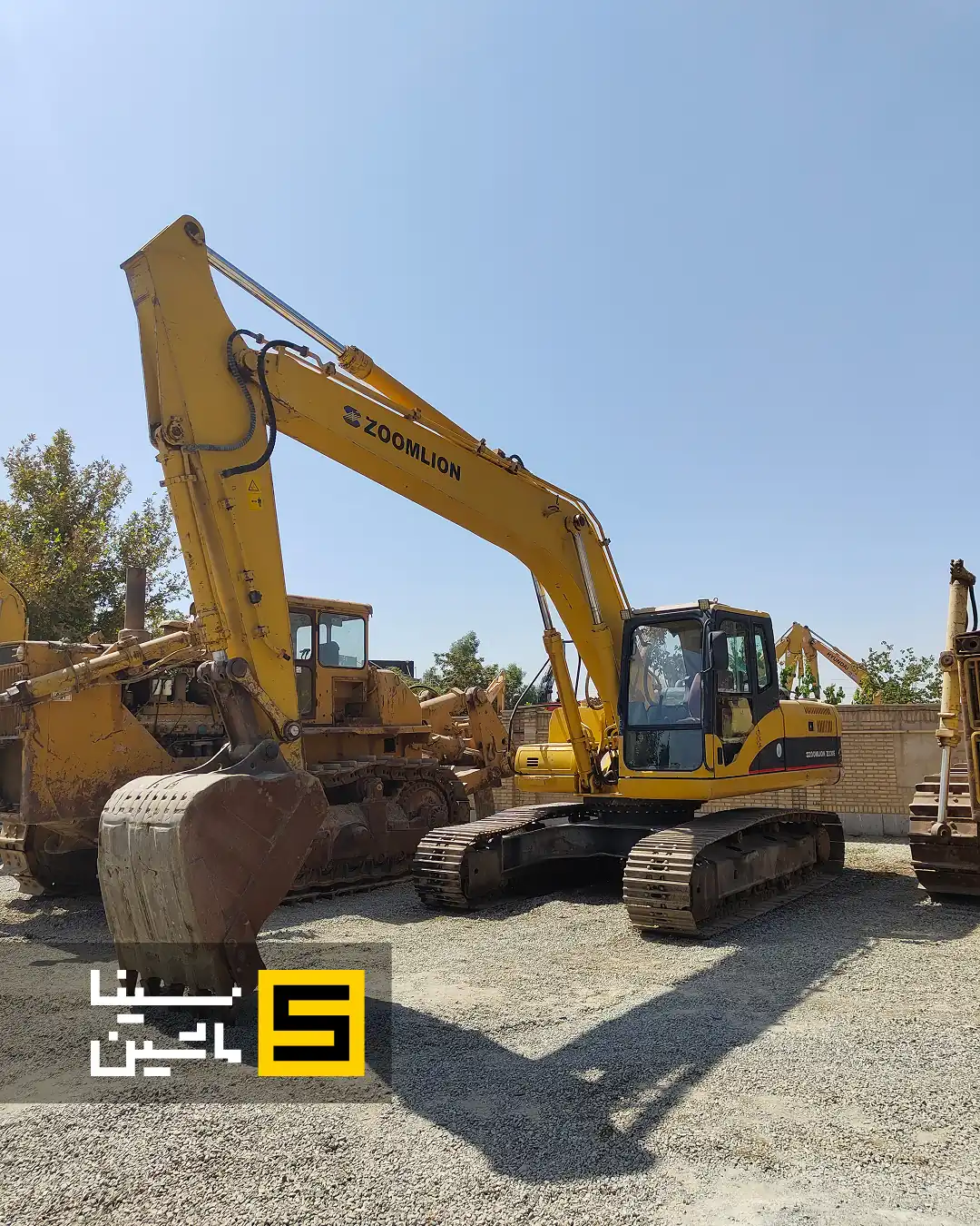 خرید و قیمت بیل مکانیکی زوملاین کارکرده مدل ۲۰۱۲ سینا ماشین
